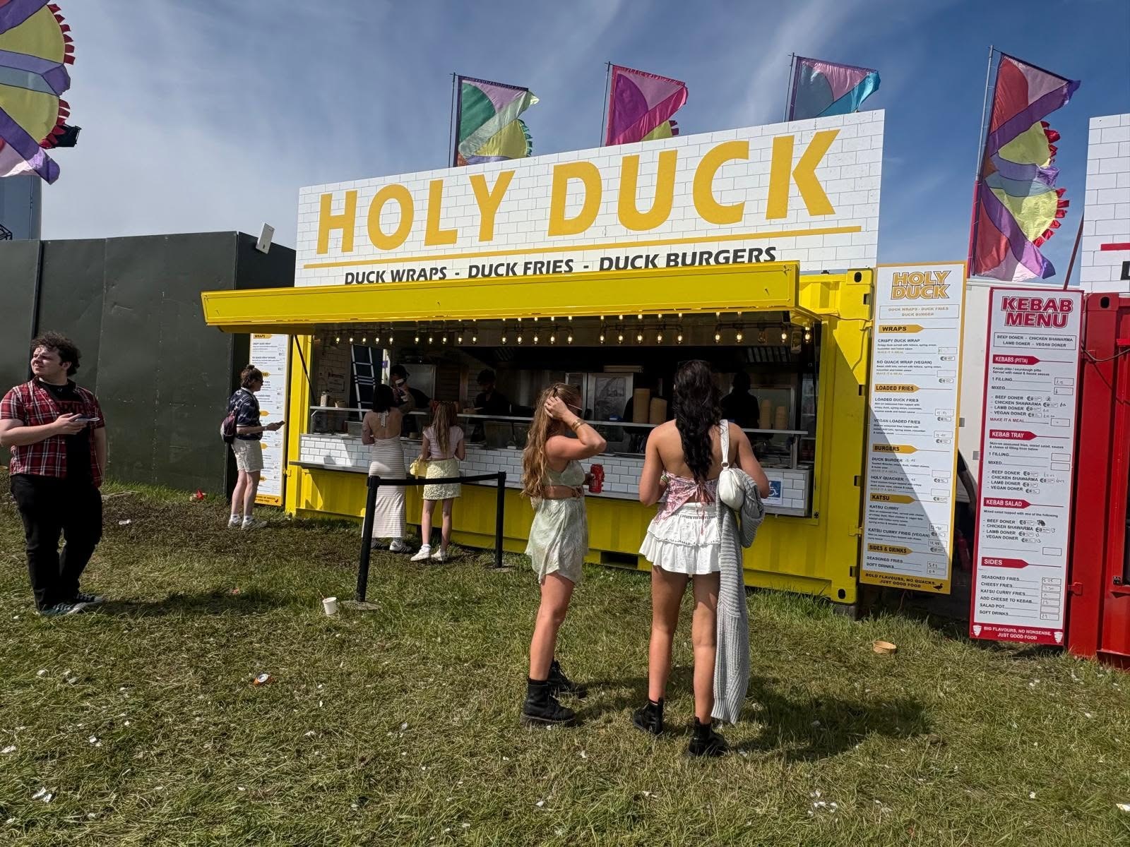 Finished yellow Holy Duck shipping container catering unit