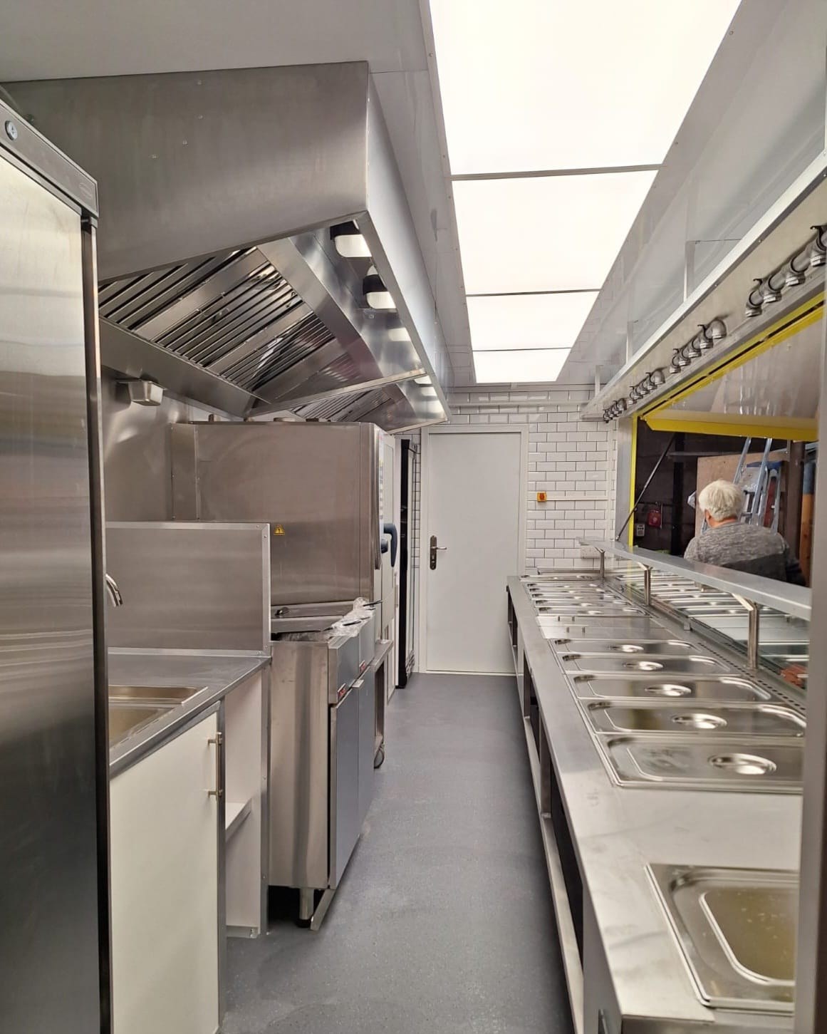 Stainless steel kitchen interior inside a Kio Pod catering container