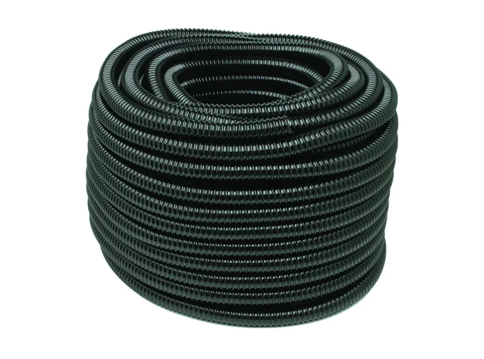 Coiled black hose on a white background