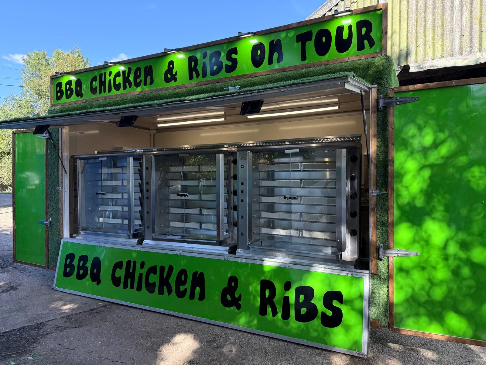 Green BBQ Chicken and Ribs catering unit with branded frontage
